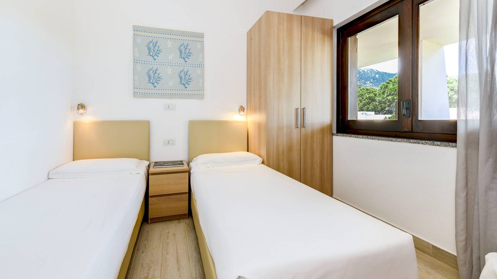 Chambre Deluxe Family vue mer – Cormoran Resort Villasimius